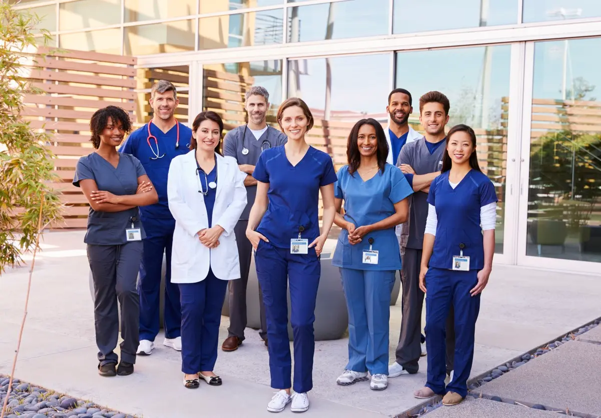 Nursing professionals using BoardCerts exam preparation resources on a laptop