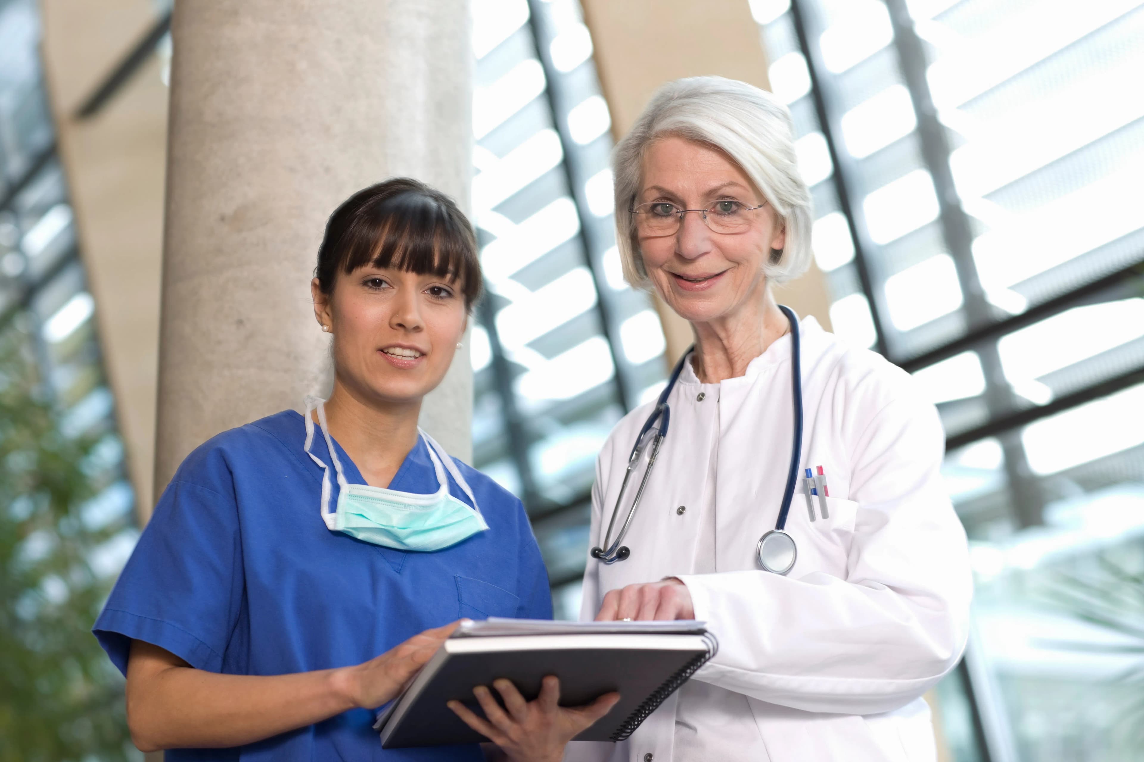 Healthcare professionals discussing institutional group purchase and onboarding for BoardCerts